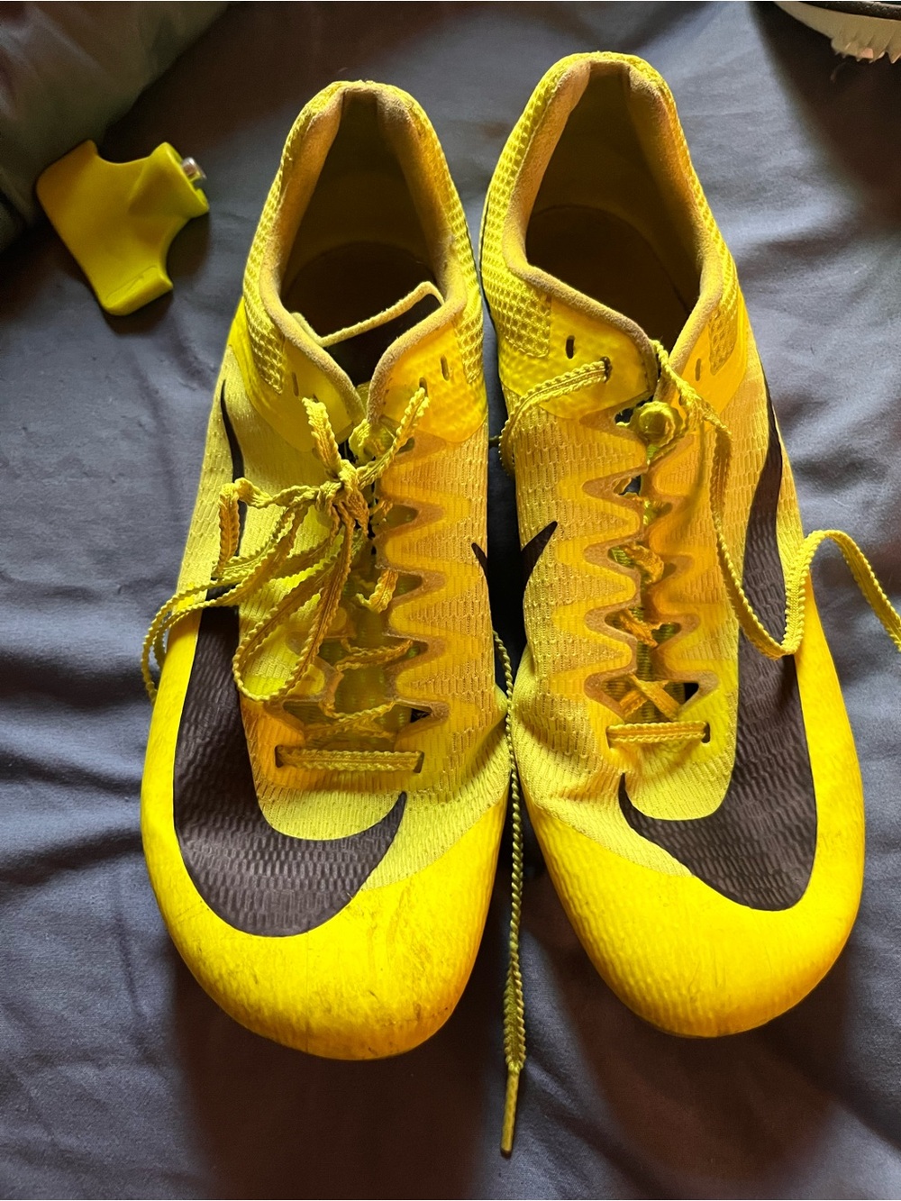 Nike Men's Yellow Athletic Track Cleats with Black Swoosh